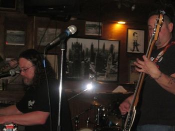 Chris Ramey on steel and Tony Soto on bass with the L-Town Allstars @ Dillinger's, Lafayette, CO, 1-28-2011.
