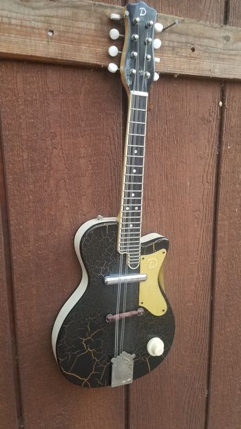 this is a one-of-a-kind Danelectro electric mandolin prototype I built, but never went into production.
