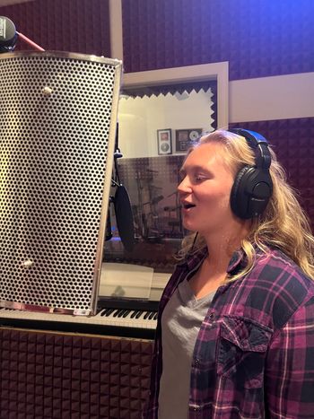 Ally recording her vocals on Snowfall for Family Band
