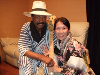 Larry Graham and Midori Hirayama after autographing bass - Tokyo - 2010
