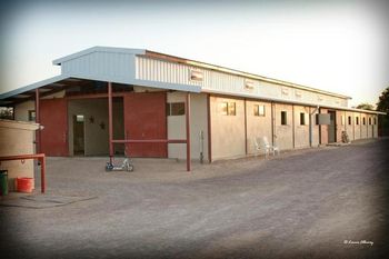 Our insulated steel back barn has double insulated steel doors at each end and each of the 2 wash racks have their own steel insulated double slide doors. Here the double insulated doors at this end of the barn are shown open.
