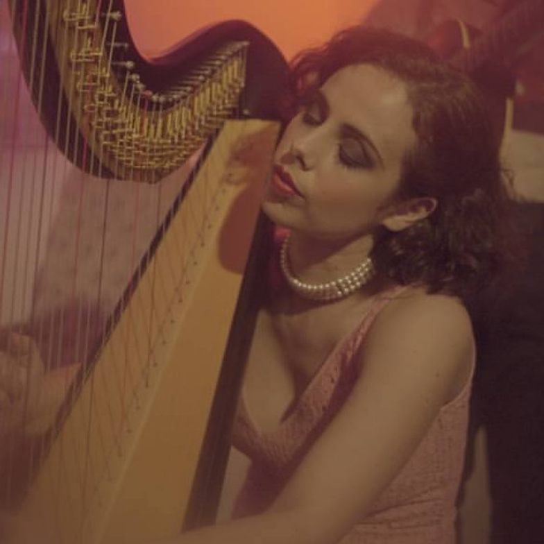 Margot Sergent playing Harp