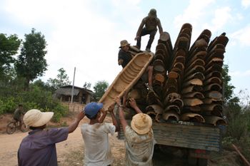 Bomb scrap metal dealers do a brisk trade on the Ho Chi Minh Trail in Laos
