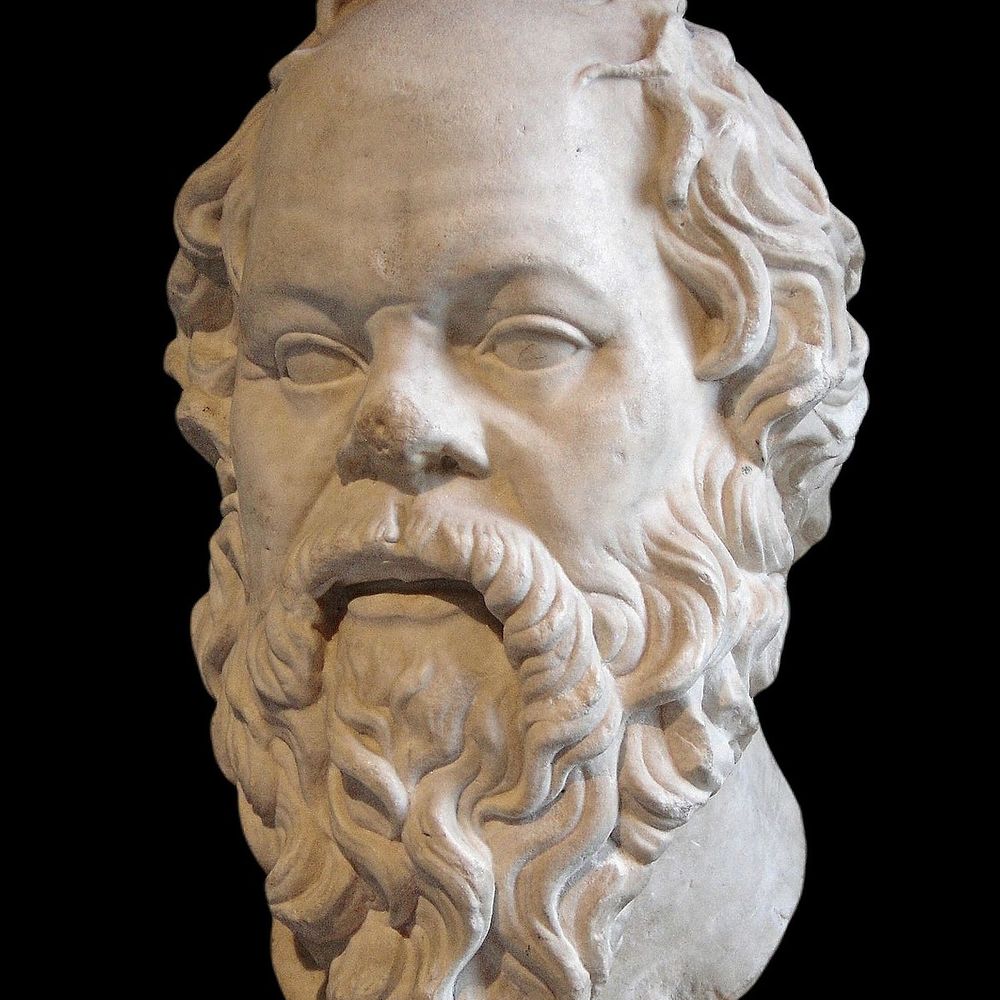 carved bust of Socrates from the louvre museum