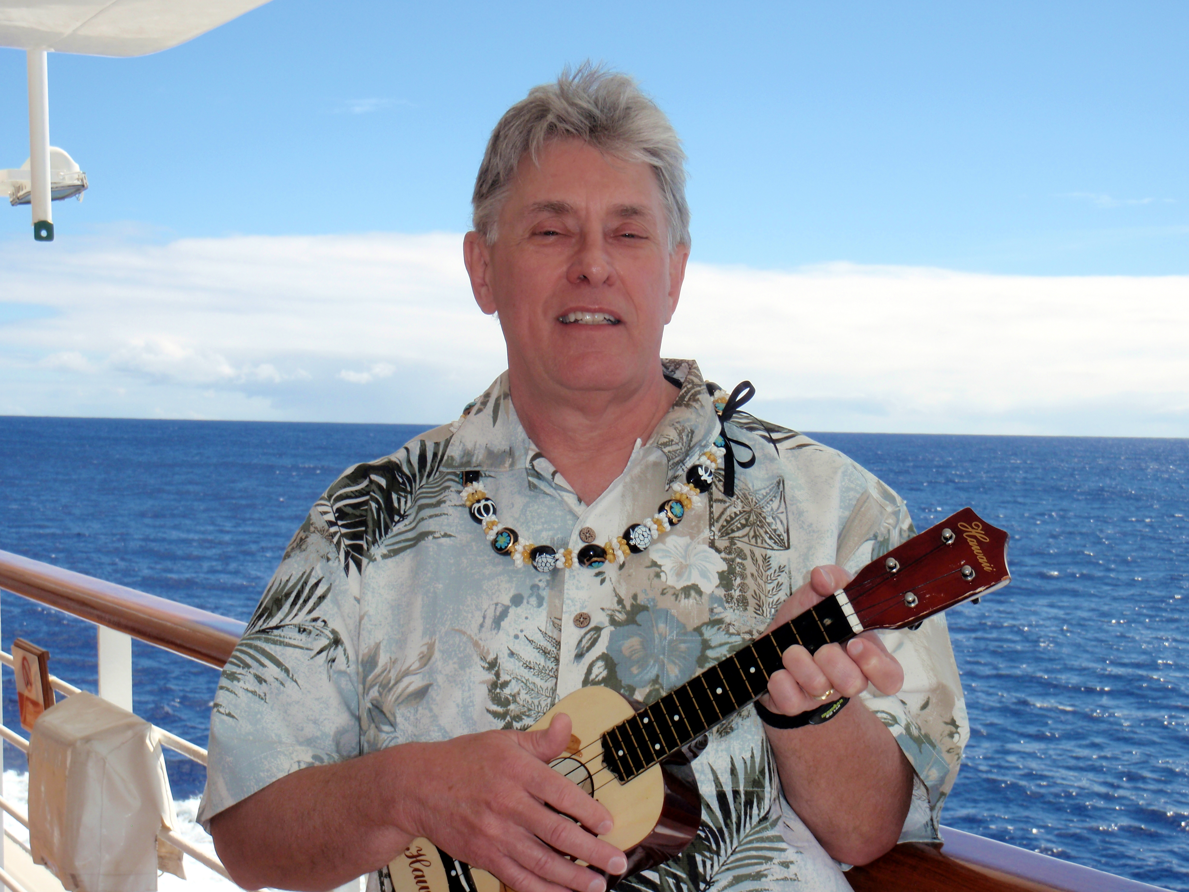 Songdog student with ukulele on a cruise ship in Hawaii