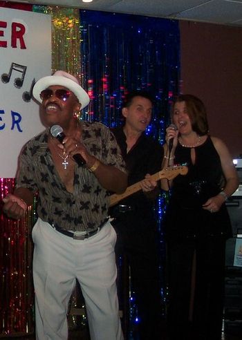 Tony & Tricia singing with Bobby Hendricks of the Drifters. Aug 2009
