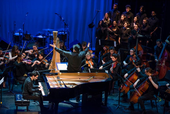 Eugene conducts "Luys I Luso Suite" featuring  Tigran Hamasyan. Berklee Performance Center, March 2017. Photo by Matthew Muise.
