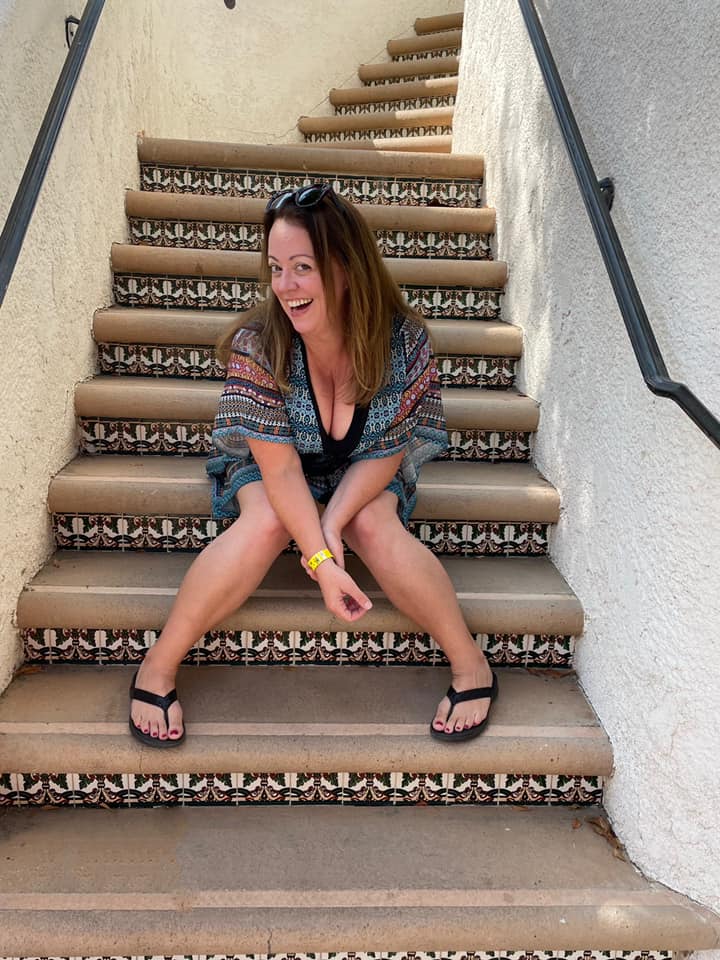 LeeAnn Tooker on a staircase