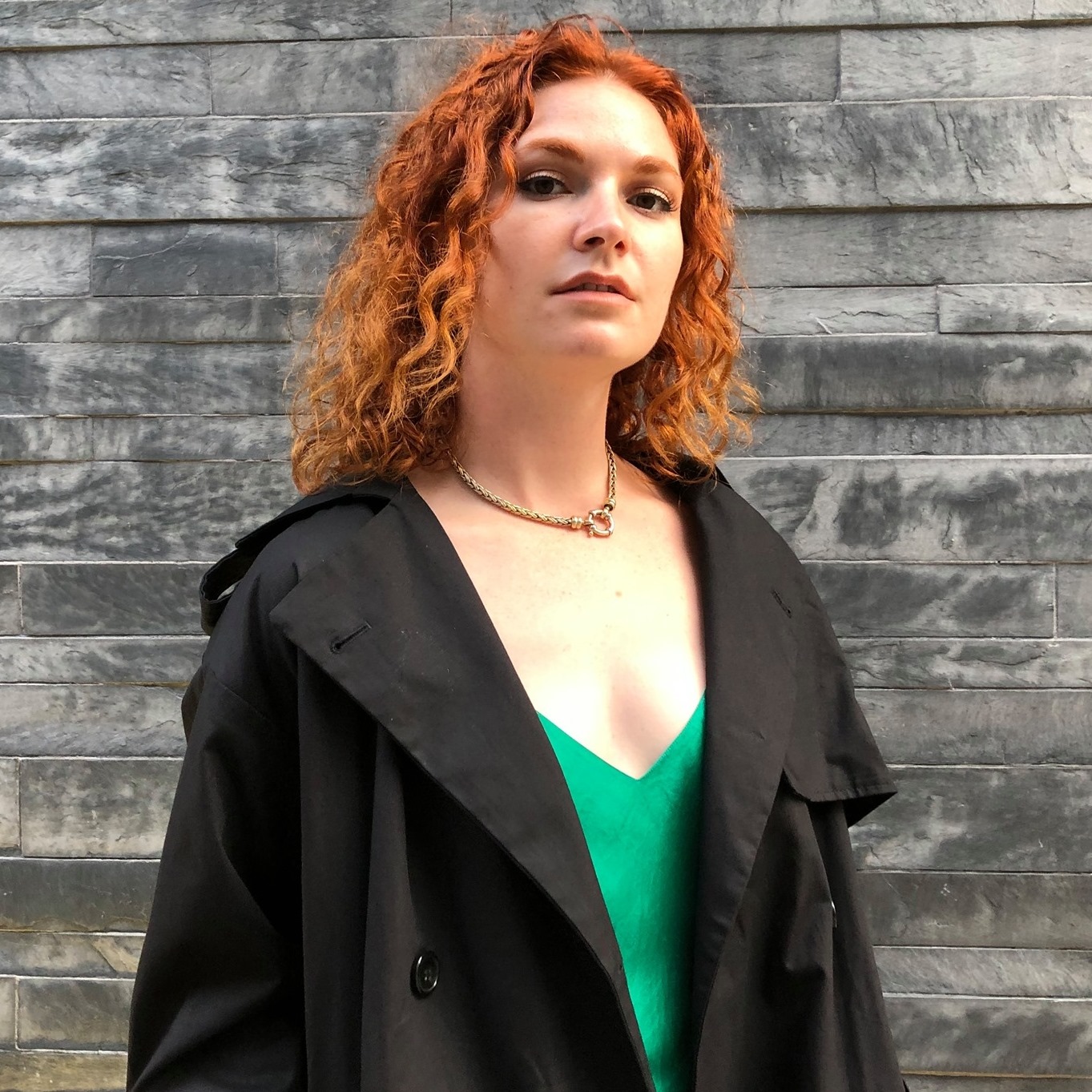 Valerie Vonn, green dress, red hair, black coat