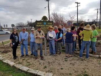 Ann with Master Gardeners Club caring for Blue Star Family Memorial in McGregor Texas; she presented Vietnam War Lapel Pins to two gardeners.
