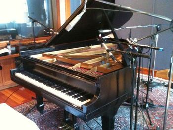 The Steinway B piano at Imaginary Road. Tom uses as many as 11 microphones on the piano.
