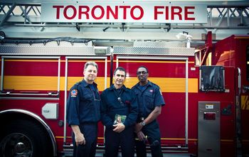 Totally awesome Toronto Firefighters holding my new CD "Take Me As I Am"
