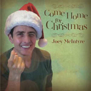 All I could think of was when my girlfriend carried around Joey McIntyre on her NKOTB lunchbox in kindergarten! LOL. I'm featured on O Come all Ye Faithful and O Holy Night.
