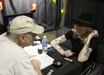 Guitar International magazine publisher, Rick Landers, interviews Johnny Winter in. Annapolis, MD - photo (c) Rick Landers.
