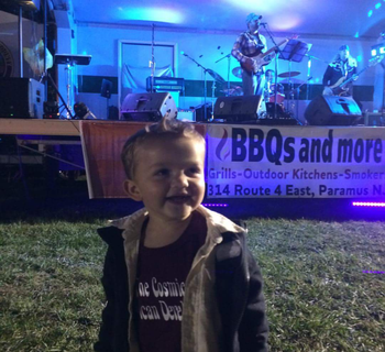 Red White & Que September 2015. Little Dusty Lauro watching his dad play with the Derelicts..

