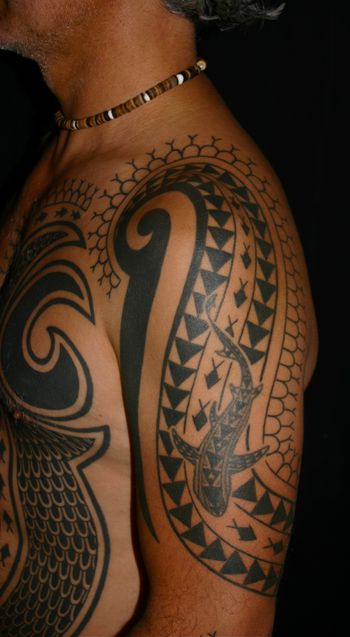 Hawaiian-influenced shark teeth motif on right arm 2012
