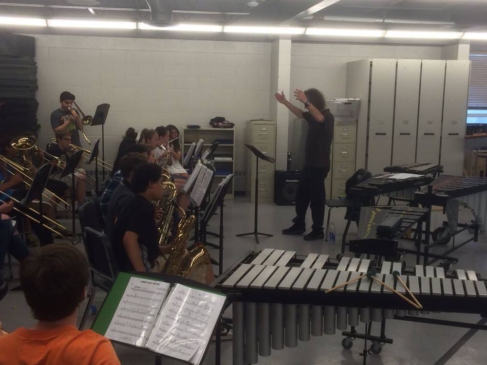 Music educator Dave Latchaw conducting rehearsal for the Memorial Park Middle School Jazz Band.