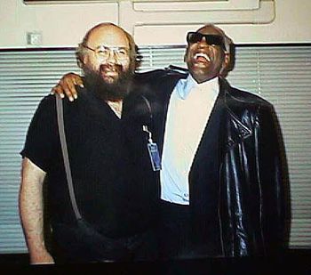 David Hoffman and Ray Charles This was early in Dave's time with him.  I love this photo! Is this not great?
