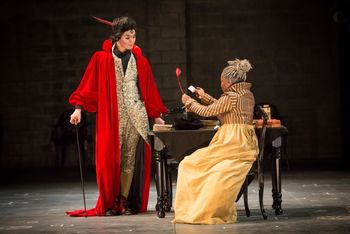 Christopher Cartmill's production of Goethe's Faust — The Bargain Goethe's FAUST directed by Christopher Cartmill, set design by Bo Ra Kwan, costumes by Sarah Zinn and lighting design by Catherine Cusick — pictured Mephistopheles (Timothy Bright) and Faust (Candace Taylor) photo by Matt Pilsner
