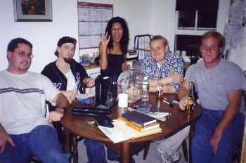 Dennis, Chris, Nadia, Marc and John Madden pre-gaming at the old 43rd street apartment in Astoria.  Dennis was actually our guitar player for our very first gig in September 2001.
