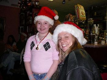 Hannah and Jules model santa hats for Jingle Bells.
