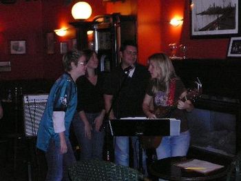 Meaghan, Jules, Tara and Mark sing "Suspicious Minds."
