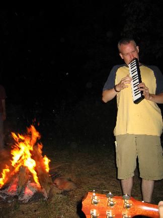 Marc playin' by the fire
