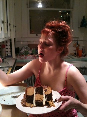 A matter of taste... Summer sampling the amazing checkerboard cake she's made. SF Xmas.
