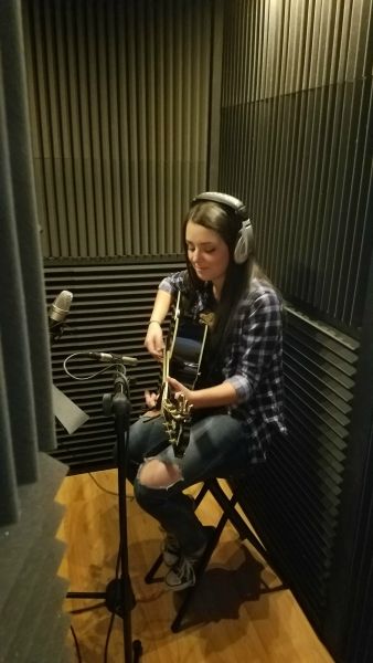 Tori Bullock tracking guitar.
