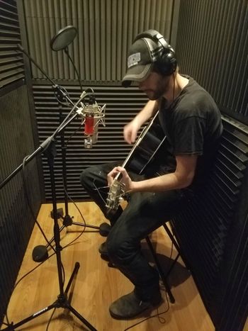 Danny (of "DNNY & JNNY") recording a guitar track.
