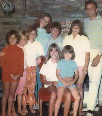 Thank you to Carlene's cousin Lorrie Carter Bennett for the details on this picture. L to R standing: Cindy Cash, Rosey Nix, Me (Lorrie), Aunt June, Kathy Cash, Rosanne Cash, Uncle John. Seated: Carlene Carter, Tara Cash in her lap. We celebrated Cindy and Rosey's birthdays that day in July 1968.
