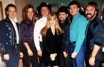 Dressing room at Desert Inn, Las Vegas opening for Garth Brooks in January 1991. L to R: David Holt (guitar), Kevin Wells (drums), Hugh Bennett (road manager), CC, Randy Leago (keys), Michael Pyle (bass), and Gary Daniels (sound engineer).
