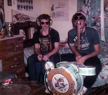 High school "band" The Bitter End, with Andy behind the Smurf drum set & Jay Meisenheimer.
