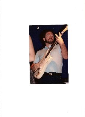 Greg with beard and strat
