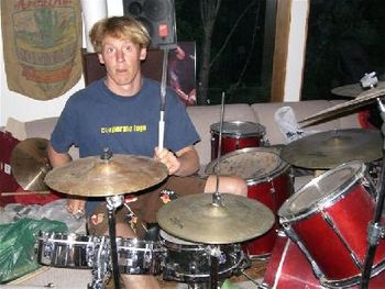 Luke playing drums durring practice 5-21-06 shot 2
