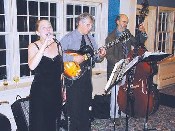 Singing for our supper at a Vermont yacht club banquet with Karl Rausch on guitar, & Jon Oltman on bass.
