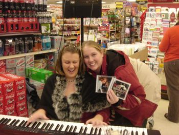 Holly and Cheri Blom buying my cd's for their business Thunder Music DJ Services
