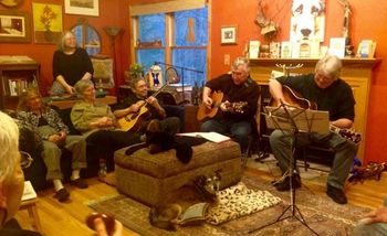 Ralph says, "They're all playing for me!" He was always at the center of song circles: Laura Pole (with shaker egg), Robin Jones, Kathy Acosta, Judy Larson, Marc Baskind, Greg, & David Simpkins, (not pictured: Mike Pearrell & Britt Mistele)
