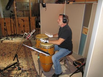 René Fortier taking the white glove approach with the congas.
