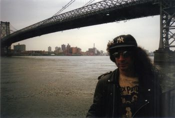 Tito Madman Gonzalez, headshot at Willamsburg Bridge, NYC
