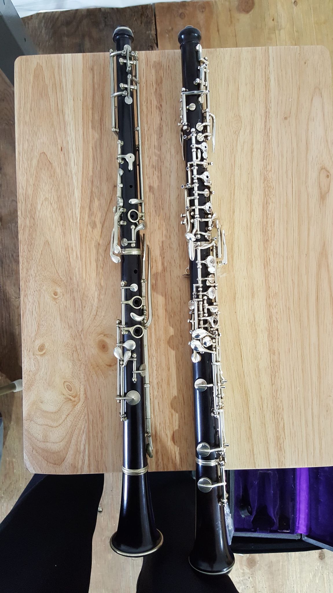 Two clarinets on a table

Description automatically generated with low confidence