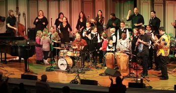 Planet Light Concert at Troy Savings Bank Music Hall 5 of 6 Joining us to sing a beautiful song written by Zorkie Nelson, percussion honoring his mother and all Mothers - "Mother Bukom" is a wonderful children's choir of 18.
