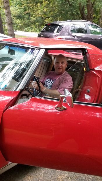 Sitting in Pete Sweeney's Absolutely beautiful classic 1974 Red Chevy Corvette
