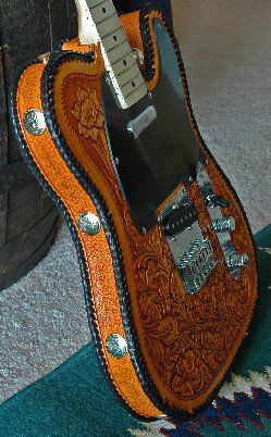 Side view of the Western Style Tele showing the engraved silver concho's
