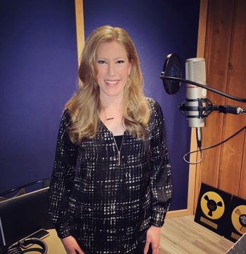Tara in the studio recording a new pop tune by Allan Licht
