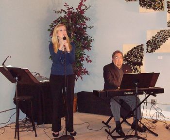 Tara performing at BeneVino, accompanied by John Petrone - February 2011
