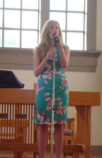 Tara singing a favorite hymn at the Sacred Songs Concert
