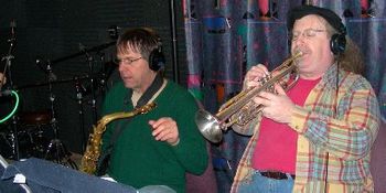 Jim Hoke, saxophone, and Ivan G. on trumpet.
