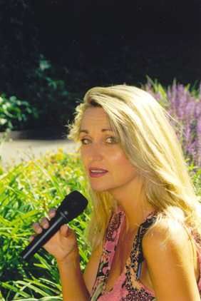 Roberta singing in garden
