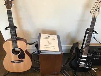 Urban Recovery Guitar Station with branded music books

